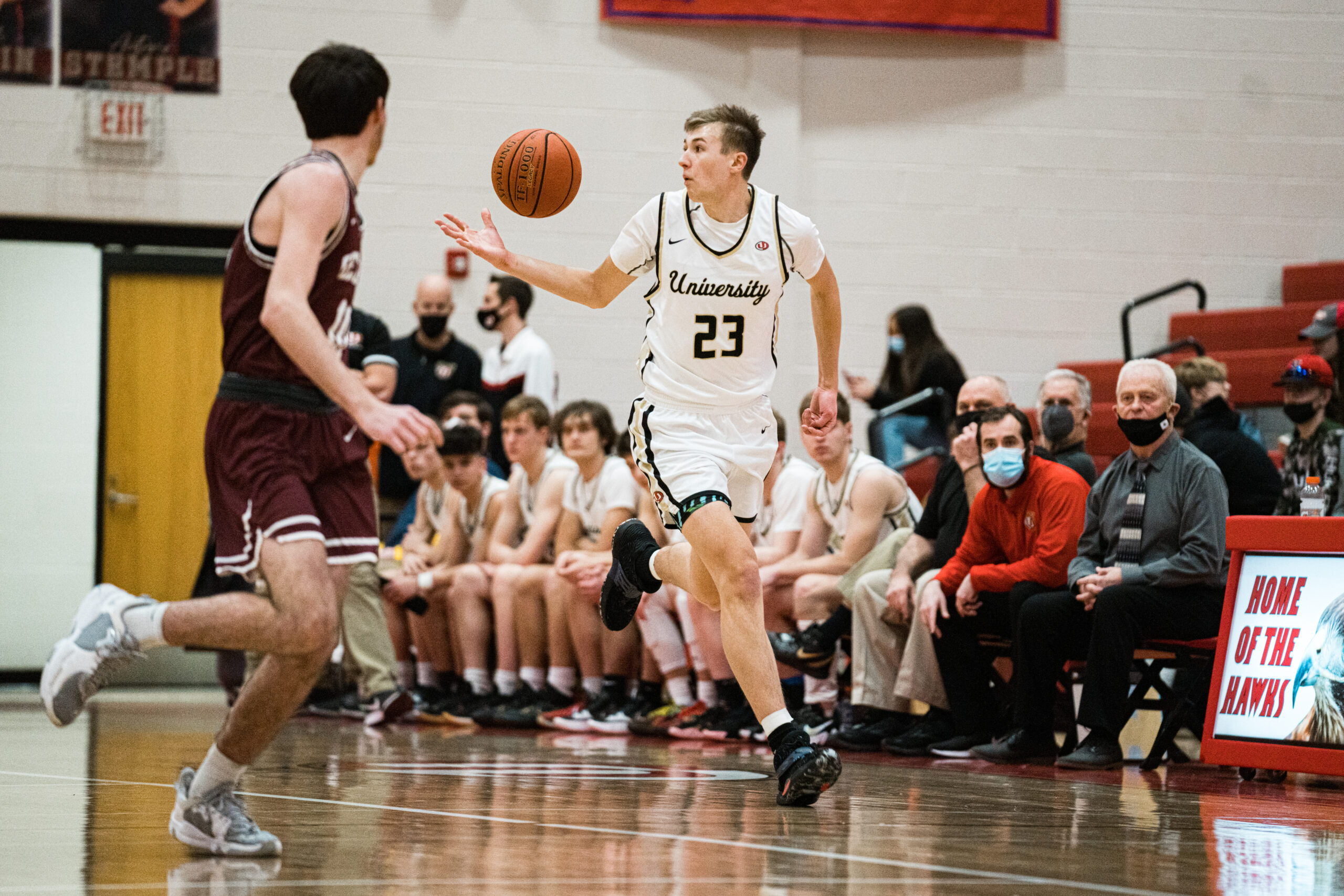 University High boys' hoops earn their 8th win in 9 games, sweep Spring Mills